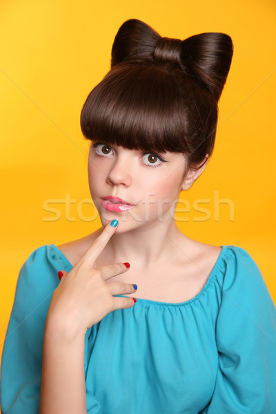 Stock photo: Beauty fashion teen girl with bow hairstyle and colourful manicu