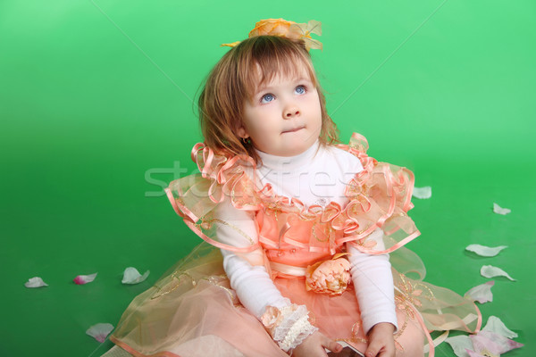 Portrait of funny little girl have a good time, looking up Stock photo © Victoria_Andreas