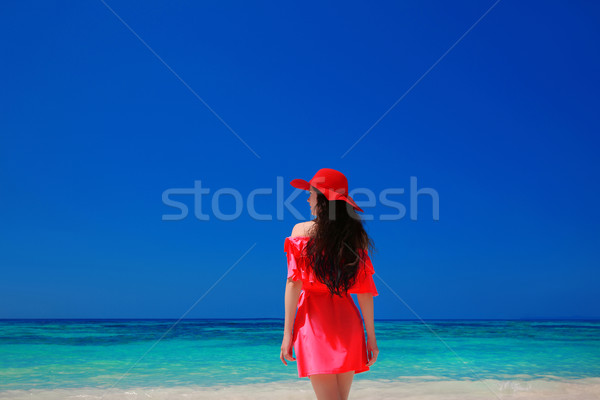 Brunetka kobieta lazur plaży atrakcyjna dziewczyna czerwona sukienka Zdjęcia stock © Victoria_Andreas