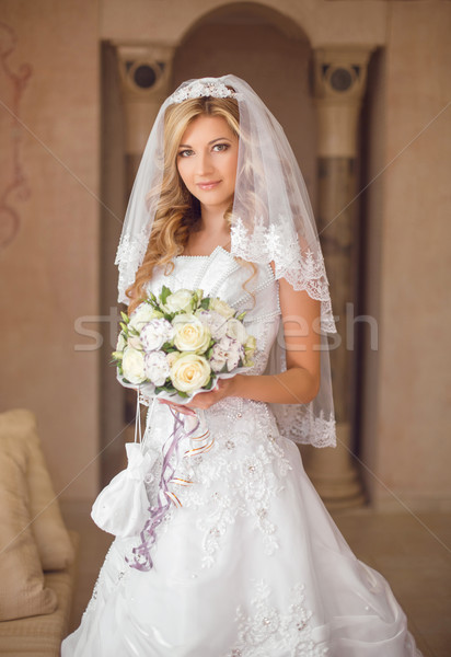 Beautiful smiling bride woman with bouquet of flowers, wedding m Stock photo © Victoria_Andreas