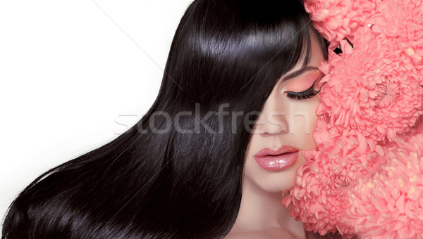 Hair Salon. Beauty Woman with Long Healthy and Shiny Smooth Blac Stock photo © Victoria_Andreas
