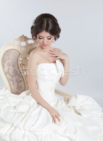 Bride. Beautiful brunette woman wearing in modern wedding dress  Stock photo © Victoria_Andreas