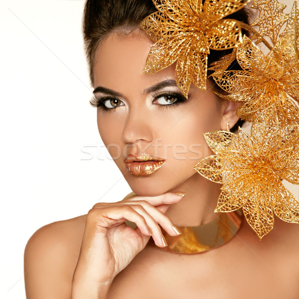 Hermosa niña dorado flores belleza modelo rostro de mujer Foto stock © Victoria_Andreas