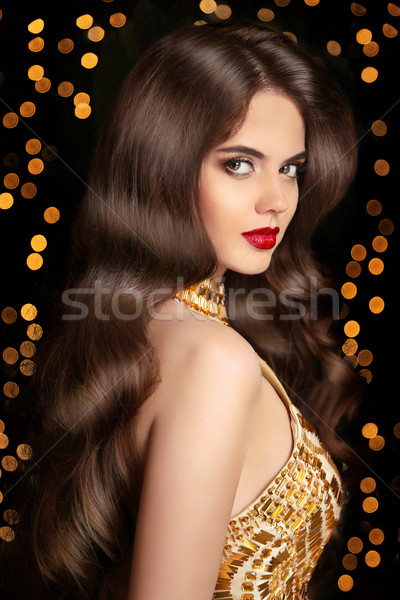 Długie włosy brunetka dziewczyna błyszczący falisty fryzura Zdjęcia stock © Victoria_Andreas