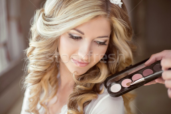 Eye shadow powder makeup. Attractive Girl bride portrait with lo Stock photo © Victoria_Andreas