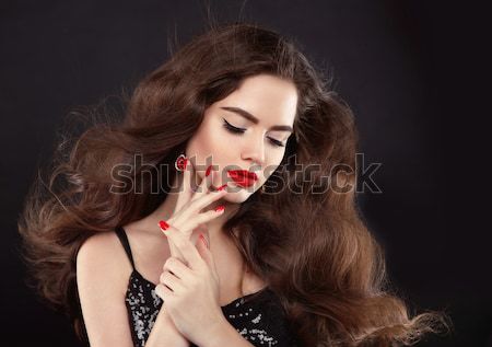 Woman with beauty long curly brown hair and red lips. Fashion wo Stock photo © Victoria_Andreas