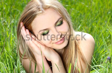 young happy woman in green field Stock photo © Victoria_Andreas