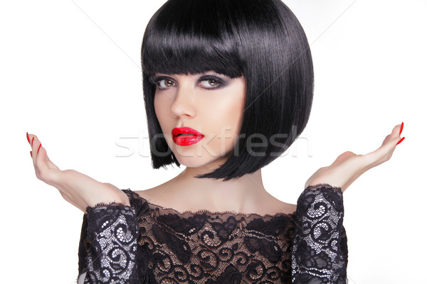 Black bob short hairstyle. Brunette girl model with Open hands o Stock photo © Victoria_Andreas