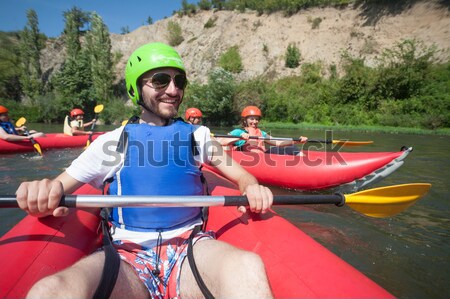 Dois rafting colisão vermelho inflável rápido Foto stock © vilevi