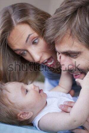 Father mother baby emotion Stock photo © vilevi