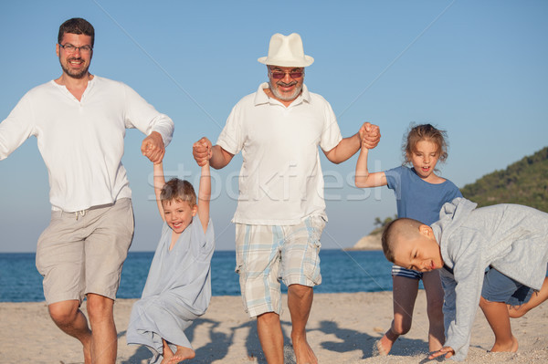 Running Generations Grandfather Kids Father Fun Stock photo © vilevi