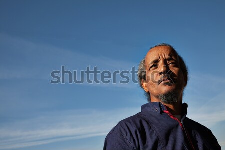 Hombre negro retrato cielo cielo azul Foto stock © vilevi