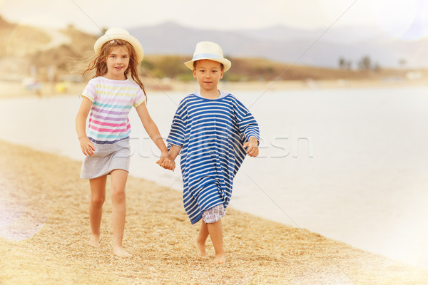 Kids Holding Hands Beach Stock photo © vilevi