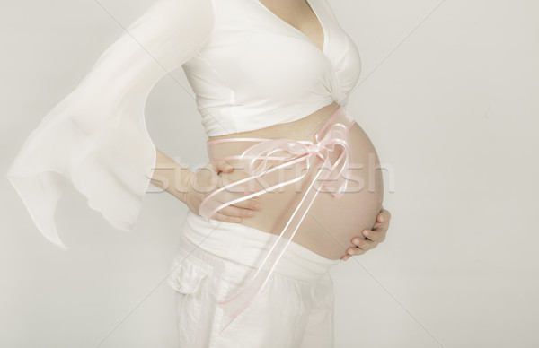 Femme babe fille torse rose abdomen Photo stock © vilevi