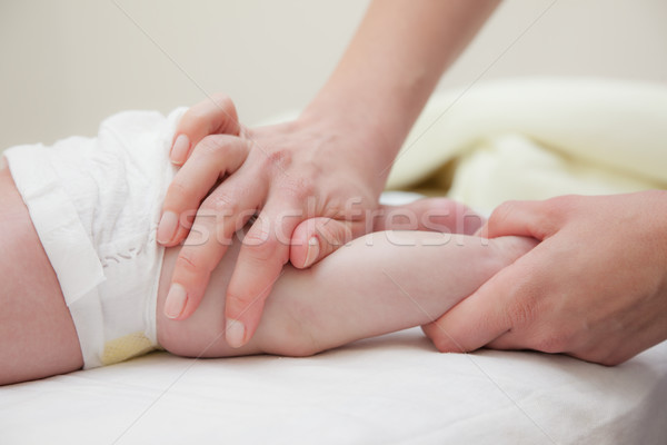 Baby Legs Massage Hands Stock photo © vilevi