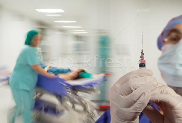 Spital seringă medic mănuşi mişcare neclara Imagine de stoc © vilevi