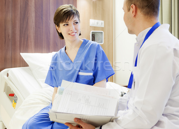 Happy healed patient talking doctor hospital Stock photo © vilevi