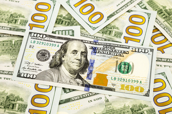 new edition 100 dollar banknotes, currency for banking and finan Stock photo © vinnstock