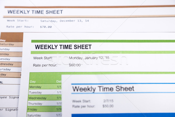 Weekly time sheet forms for payroll Stock photo © vinnstock