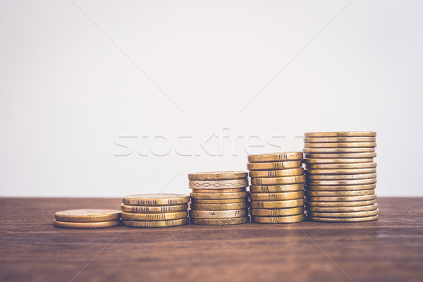 Increase coin stacks, saving money growth fund. Stock photo © vinnstock