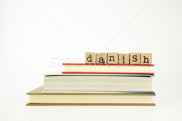 danish language word on wood stamps and books Stock photo © vinnstock