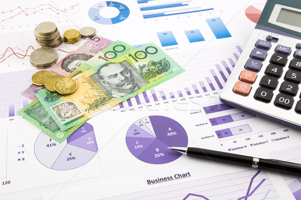 australia currency on graphs, financial planning and expense rep Stock photo © vinnstock