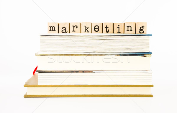 marketing wording stack on books Stock photo © vinnstock