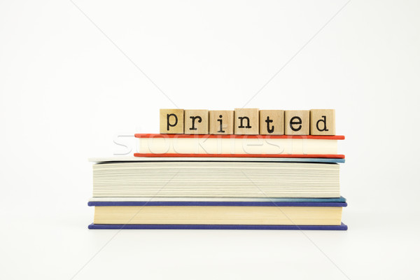 Stock photo: printed word on wood stamps and books
