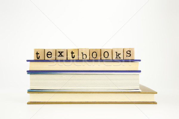 textbooks word on wood stamps and books Stock photo © vinnstock
