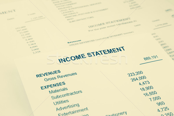 Income statement reports for business accounting in sepia tone Stock photo © vinnstock