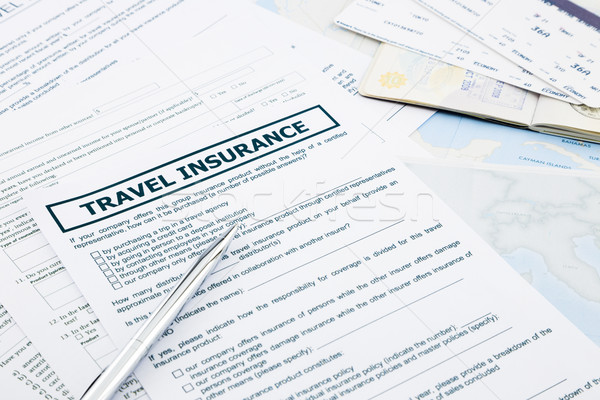 travel insurance form, passport and tickets  Stock photo © vinnstock