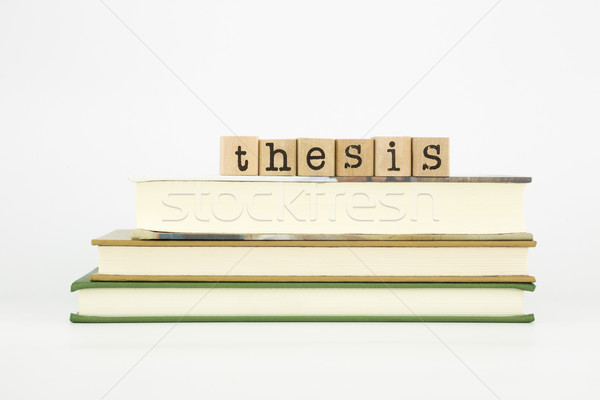 thesis word on wood stamps and books Stock photo © vinnstock