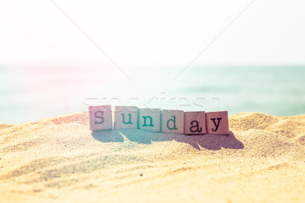 Sunday word on sea beach in retro style  Stock photo © vinnstock