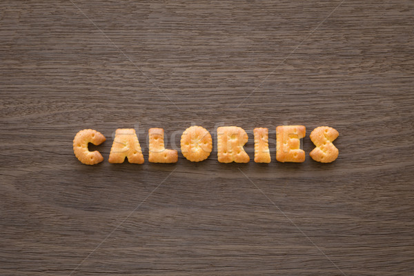 Woord calorieën alfabet biscuits hout boven Stockfoto © vinnstock