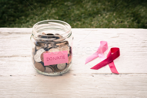 Donate money to breast cancer charity Stock photo © vinnstock