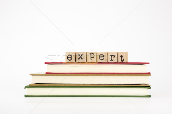 expert word on wood stamps and books Stock photo © vinnstock