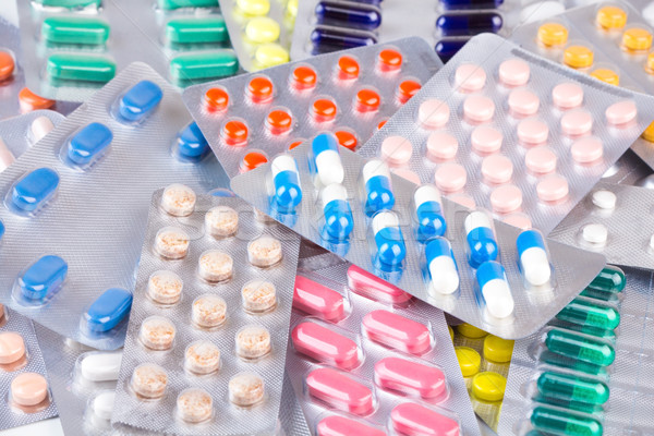 Bunch of medicines in aluminum container Stock photo © viperfzk