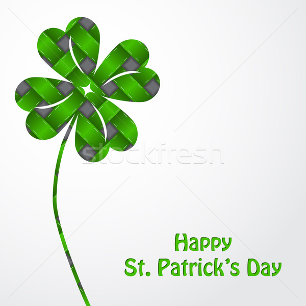 St Patrick's shamrock on green texture and white backdrop Stock photo © vipervxw