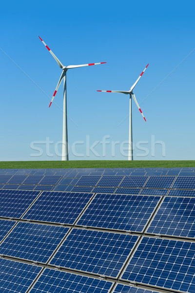Panouri solare turbine eoliene câmp soare abstract albastru Imagine de stoc © visdia