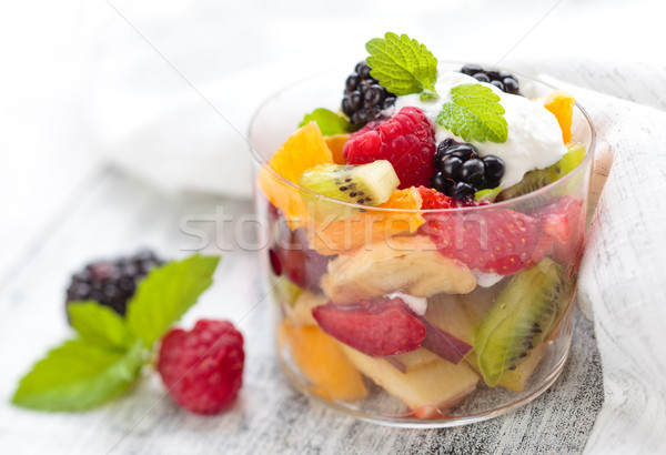 Saine salade de fruits crème menthe verres alimentaire [[stock_photo]] © Vitalina_Rybakova