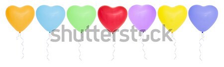 Colorful  heart-shaped balloons in a row.  Stock photo © Vitalina_Rybakova