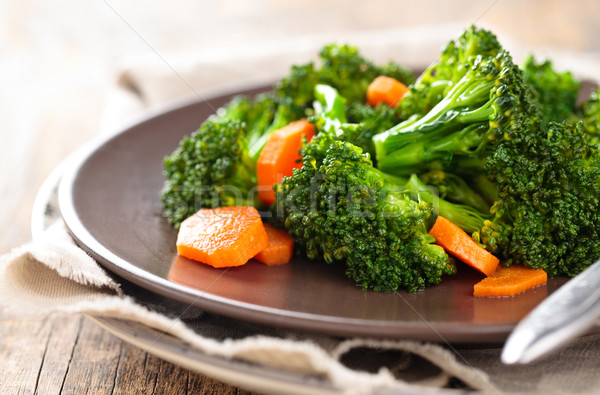 Steamed broccoli on plate. Stock photo © Vitalina_Rybakova