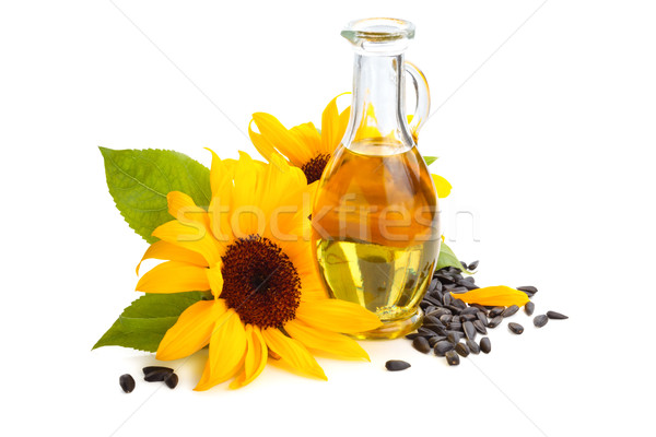 Sonnenblumenöl Sonnenblumen Sonnenblumen Samen isoliert weiß Stock foto © Vitalina_Rybakova