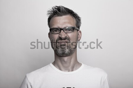 Happy man holds one thumb up Stock photo © vizualni