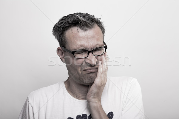 Portret man tong achtergrond bril tanden Stockfoto © vizualni