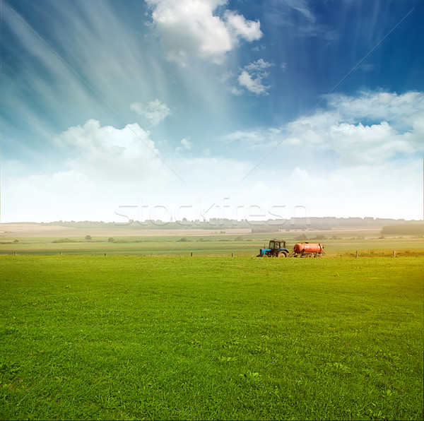 tractor in  field gather crops Stock photo © vkraskouski