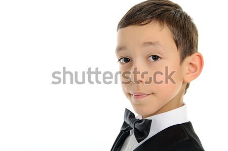 Schooljongen zwart pak geïsoleerd witte portret jonge Stockfoto © vkraskouski