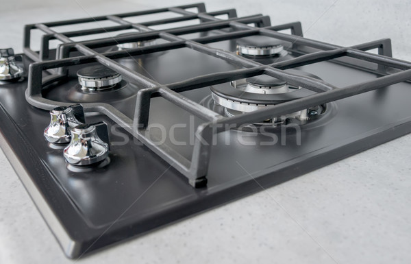 New and modern shining metal gas cooker Stock photo © vlaru