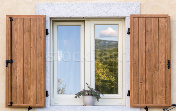 window with open wooden shutters Stock photo © vlaru