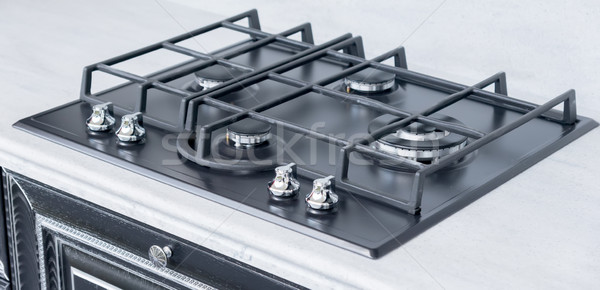 New and modern shining metal gas cooker Stock photo © vlaru